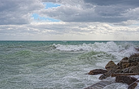 Sea Storm tempest on the rocks photo