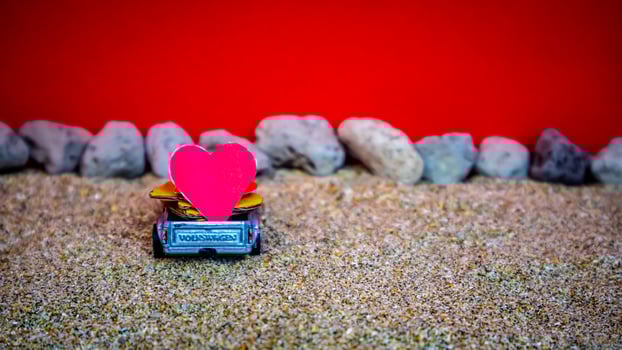 Minahasa, Indonesia  December 2022, the toy cars transporting hearts photo
