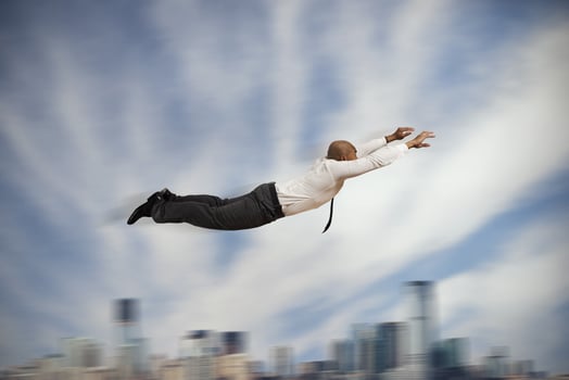 Flying Super hero businessman photo