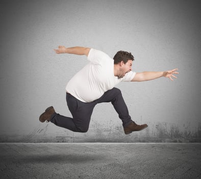 Fat man runs photo