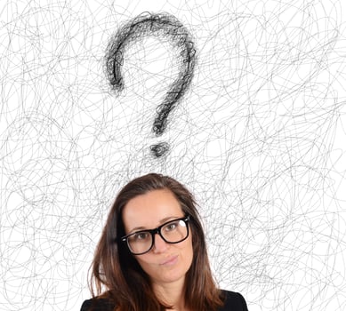 Businesswoman with big question photo