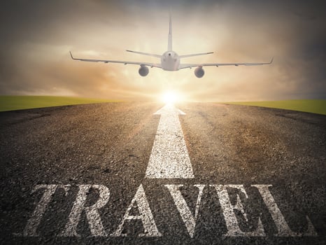 Travel concept with plane taking off photo