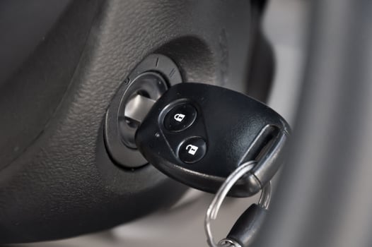 car key in the keyhole, starting the car photo
