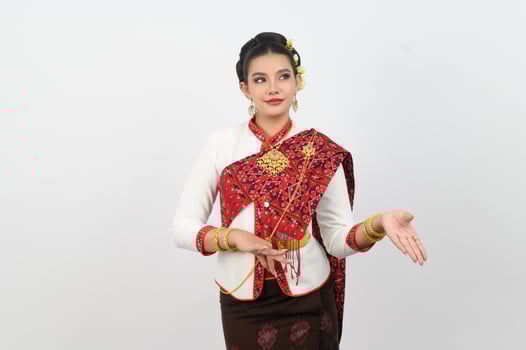 Asian pretty woman in northeastern dress stand in beautiful Thai dance photo