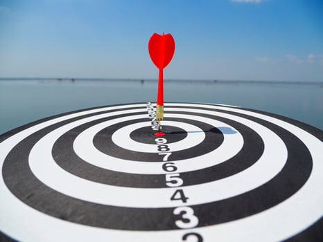 success target business darts red target in the center background is a large sea photo