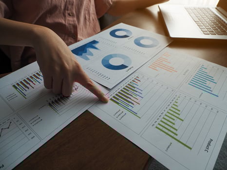 Businesswoman pointing at a graph online meeting planning to work working from home photo