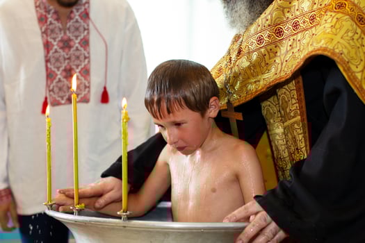 Orthodox baptism of a Belarusian child in a church. photo