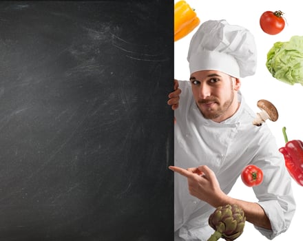 Chef with blackboard photo