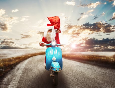 Fast Santa Claus on motorbike photo
