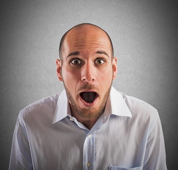 Stunned man close-up photo
