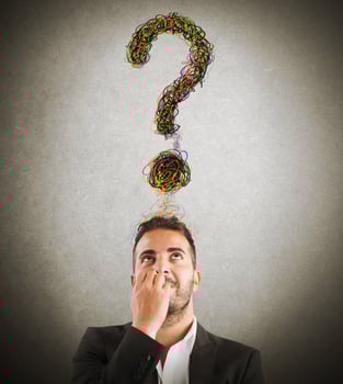 Businessman with big question photo