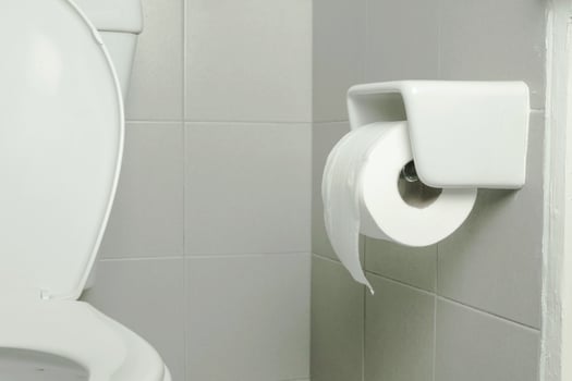 close up toilet paper in bathroom photo