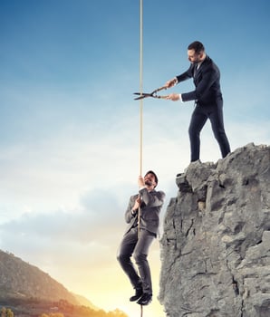 Businessman who doesn't help a competitor. Concept of unfair competition photo