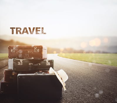 Luggage resting on asphalt photo