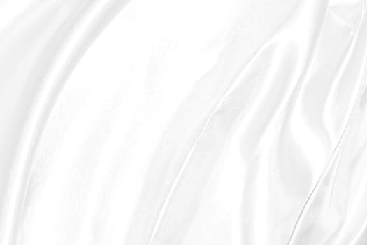 Closeup elegant crumpled of white silk fabric cloth background and texture photo