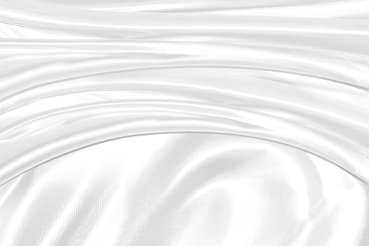Closeup elegant crumpled of white silk fabric cloth background and texture photo