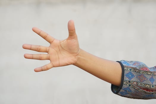 human hand outstretched to the side photo