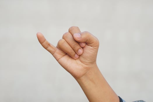 Human hand making a sign of reconciliation photo