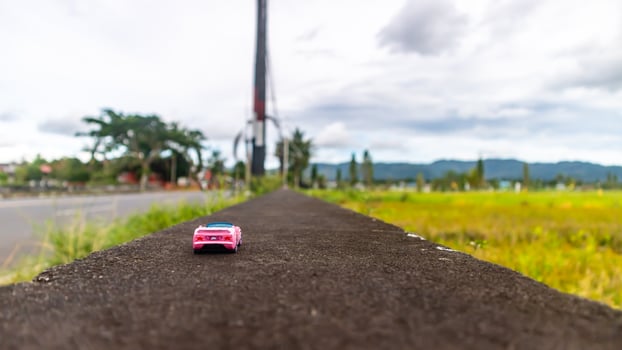 minahasa, Indonesia  January 2023, toy car in the rice field photo