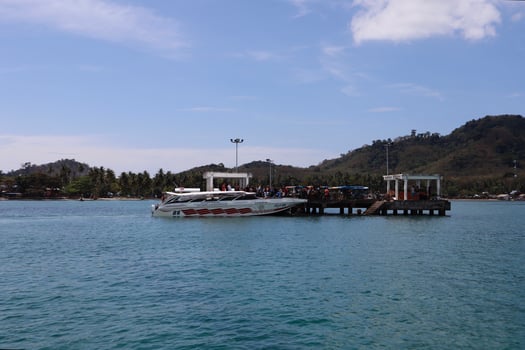 Libong Pier, Libong Island, Trang Province, Thailand, February 2023 Speed boats are now picking up both Thai and foreign tourists to travel to the islands. photo