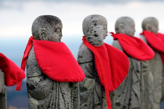 Statues of five Buddhist saints on top of Mount Omuro, Japan photo