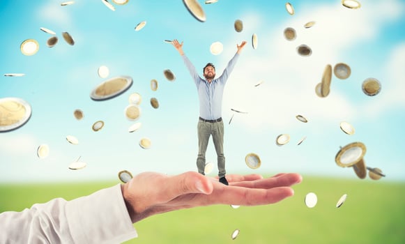 Big hand holds a businessman that achieves the success photo