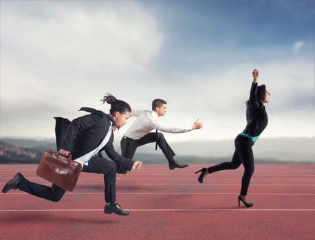 Businesswoman wins a run contest against the competitors. Concept of success photo