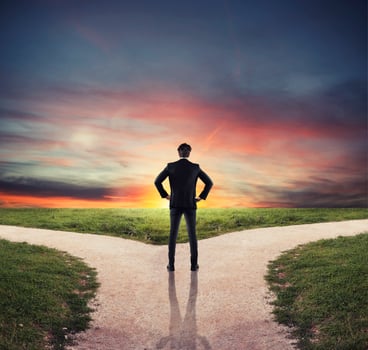 Choices of a businessman at a crossroads. Concept of decision photo