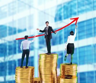 Business team draws growing arrow of company statistics over the piles of money photo