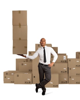 Businessman holds a pile of packages in a hand. concept of fast delivery photo