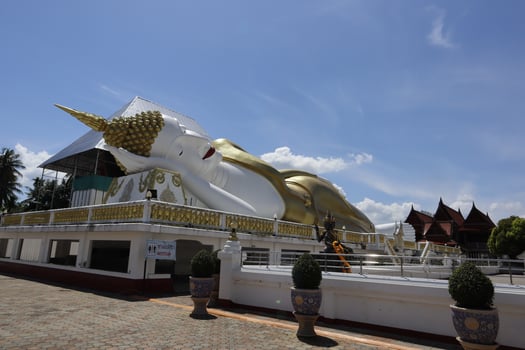 Wat That Noi, Nakhon Si Thammarat, Thailand, February 2023, Big white reclining Buddha at Wat That Noi. photo