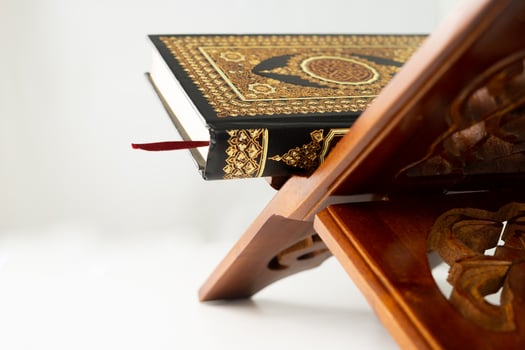 Quran book on the table for background and copy space photo