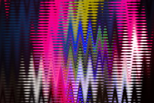 Bright multi-colored zigzags in disco style. photo