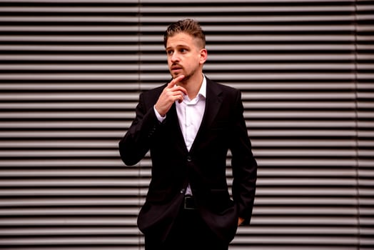 Portrait of a young businessman in a business center photo