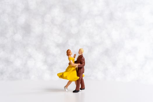 Miniature Couple dancing on dance floor , International dance day concept photo