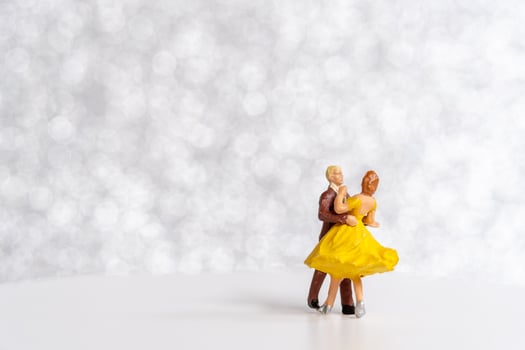 Miniature Couple dancing on dance floor , International dance day concept photo