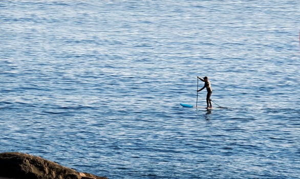 Stand up paddle at the coast of Enoshima, Japan photo