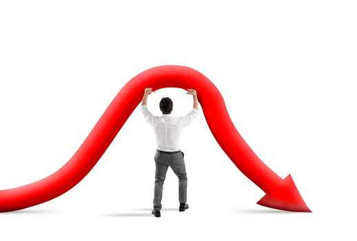 Businessman tries to improve company statistic with difficulty. Concept of failure and crisis photo