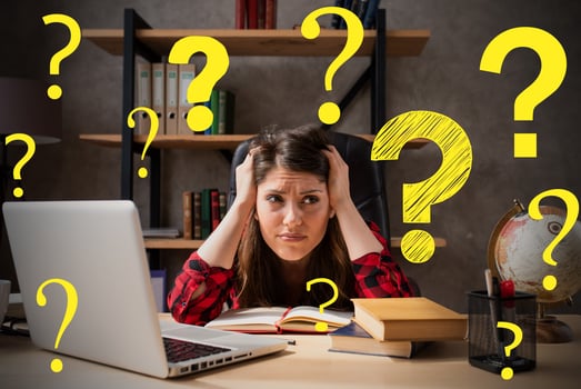 Woman works at home as smart working and has a lot of questions photo