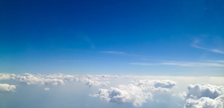 Blue sky with clouds background photo
