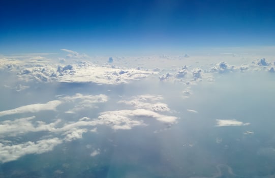 Blue sky with clouds background photo