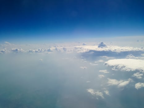 Blue sky with clouds background photo