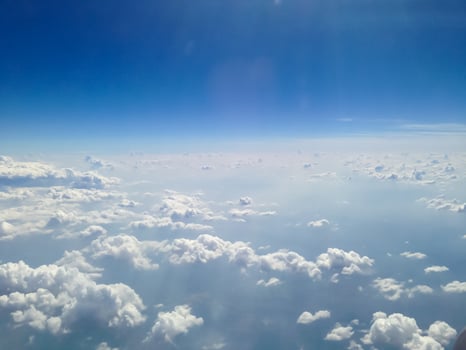 Blue sky with clouds background photo