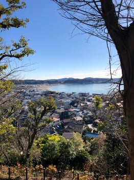 View over the city and coastline of Kamakura, Japan, on a sunny day photo