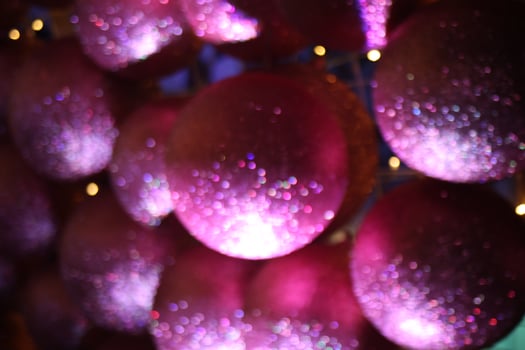 blur multicolored yellow green blue red abstract ball bokeh texture on black background. Festive defocused lights. photo