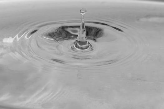 falling drops in water photo