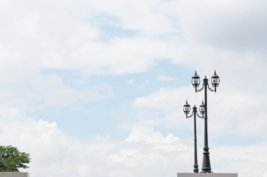 Street lamp retro on blue sky background photo