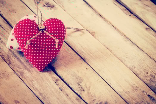 Fabric heart on wooden background with space for text photo