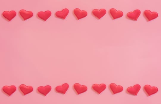 Red heart on pink pastel color background with space for text. photo
