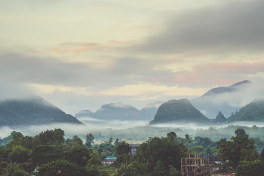 Beautiful sunrise and white mist with mountain at Vang vieng, Laos. photo